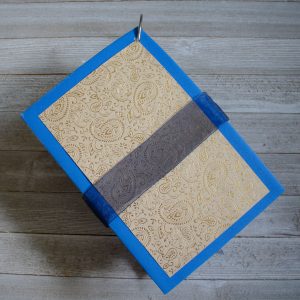 Need a way to store and save your wedding cards? Make an easy DIY card album. It comes together in an hour and turns out beautifully!