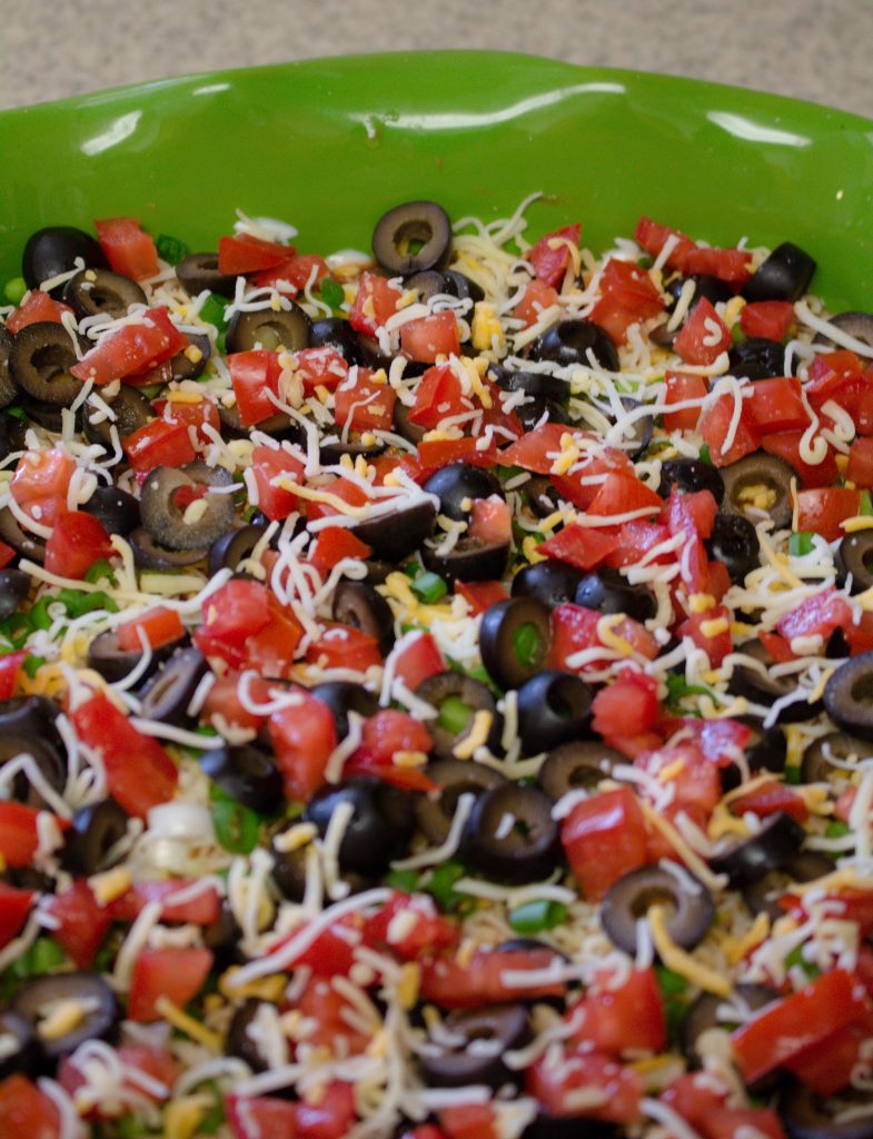 Mexican Seven Layer Dip is always a crowd pleaser and super easy to make!! 