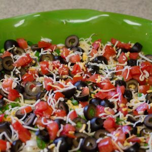 Mexican Seven Layer Dip is always a crowd pleaser and super easy to make!!