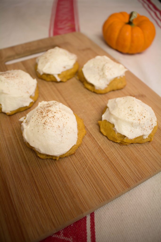 Frosted pumpkin cookies are the perfect way to celebrate fall! Try these next time you're looking for the perfect pumpkin recipe! | Teaspoon of Nose