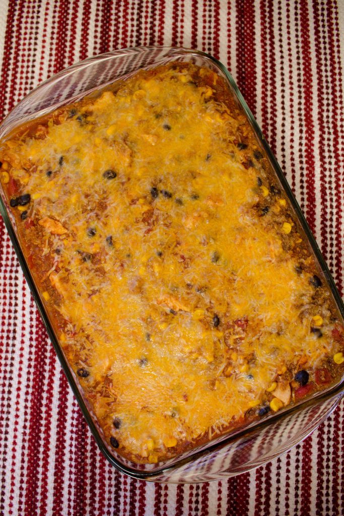 This quinoa enchilada casserole is easy to make a perfect for feeding a crowd! | Teaspoon of Nose