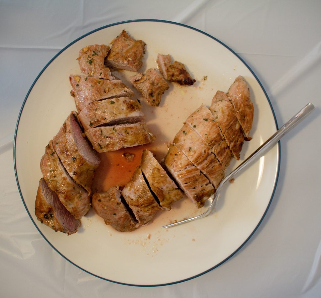 This pork tenderloin recipe is as simple as marinate, brown, and bake! | Teaspoon of Nose