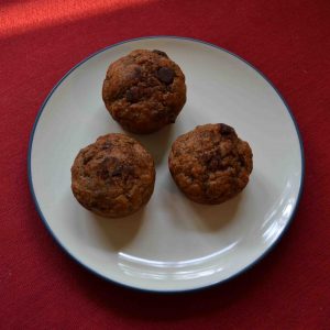 Chocolate chip banana muffins taste great and make for a delicious breakfast on the go! | Teaspoon of Nose