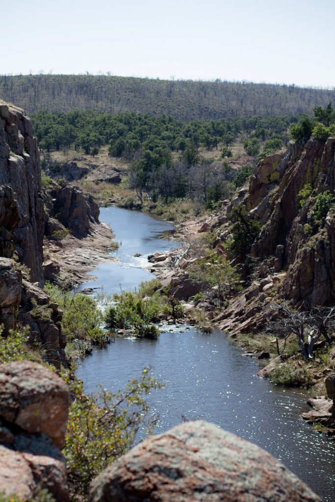 Secret Oklahoma hiking spots are the best! Check out the Wichita Mountains Wildlife Refuge for Oklahoma's biggest gorge and beautiful scenery. | Teaspoon of Nose