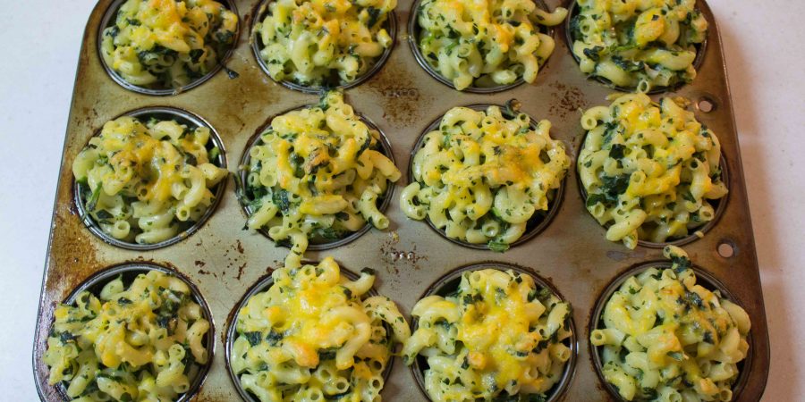 These macaroni & cheese muffins are the perfect little handheld bite as an appetizer or side dish at a party! | Teaspoon of Nose