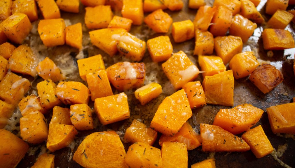 Parmesan roasted butternut squash is easy enough to pull together on a weeknight, but good enough to make it onto a holiday table! | Teaspoon of Nose