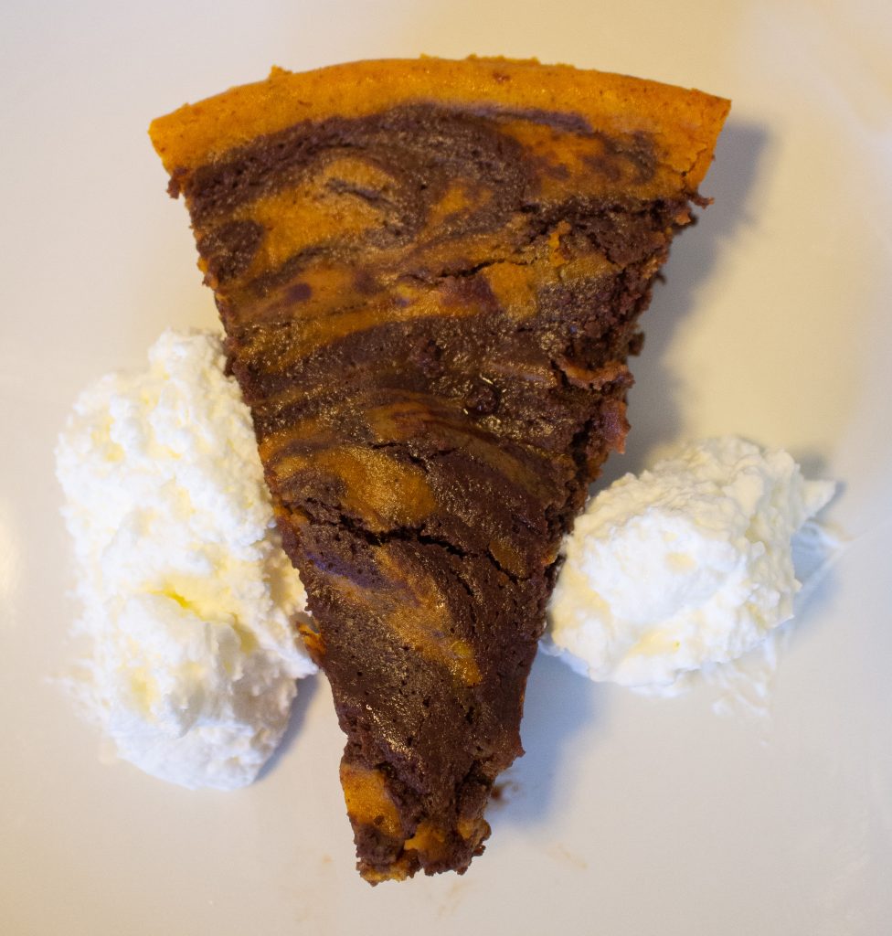 Pumpkin Brownie Pie is a mash-up of two classic American desserts: pumpkin pie and brownies! Perfect for Thanksgiving dessert!