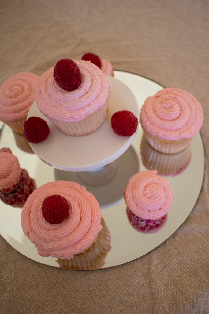 Raspberry Champagne cupcakes are light and fluffy, with champagne in both cupcakes and frosting and a zing of fresh raspberries to top it off! Bet you can't eat just one... Raspberry Champagne cupcakes are light and fluffy, with champagne in both cupcakes and frosting and a zing of fresh raspberries to top it off! Bet you can't eat just one...