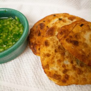 Scallion pancakes are the Chinese bread you didn't know you were missing! They're chewy, delicious counterpoints to your next Chinese dinner.