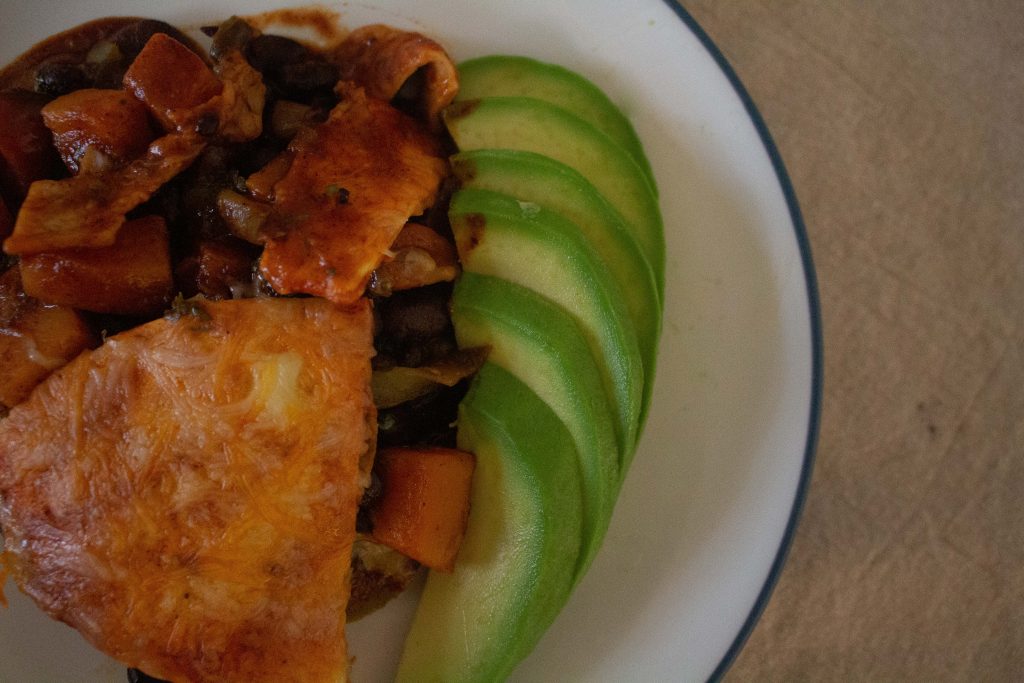 Black bean & squash enchilada casserole gives all the best parts of enchiladas in vegetarian form!