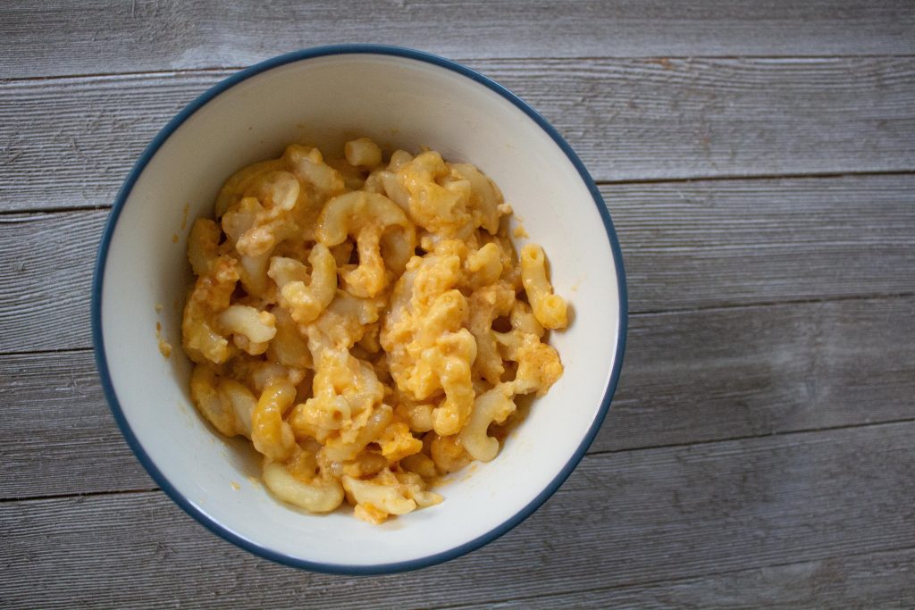 Slow cooker macaroni and cheese is the best thing you can bring to a party or potluck!