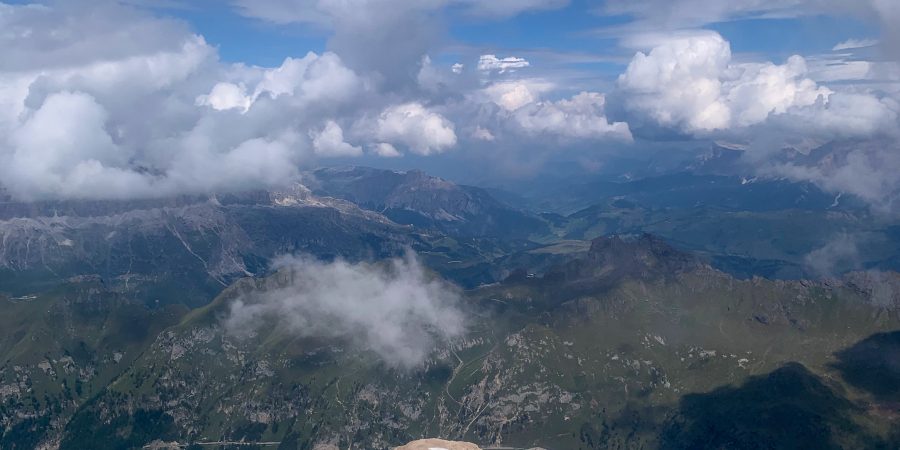 One of the best ways to experience the Dolomites year-round is take the cable car up Marmolada!
