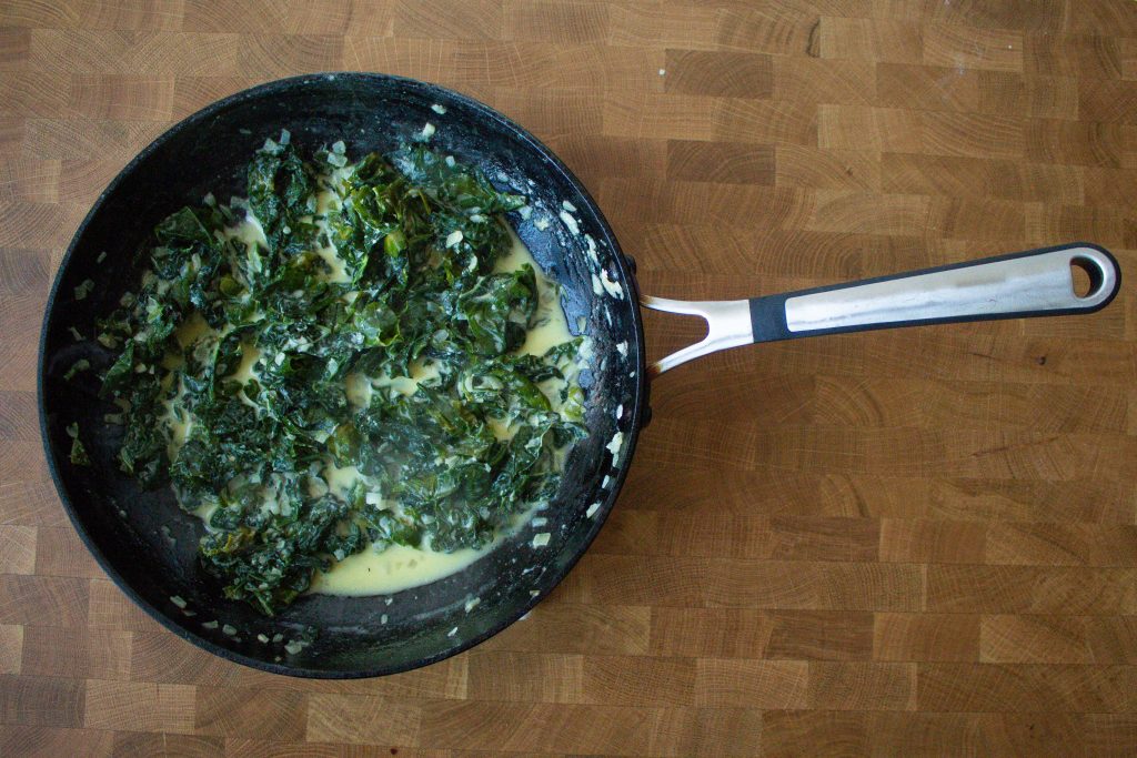 Creamed kale is the simple side dish you didn't know you were missing! Plus, it's a fantastic way to use up kale that's about to go bad.