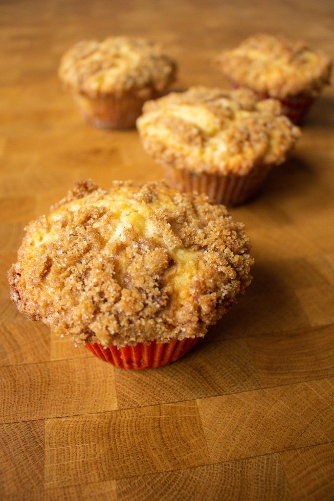 These apple muffins with streusel are the perfect sweet breakfast option with a secret ingredient that makes them perfect for spring!