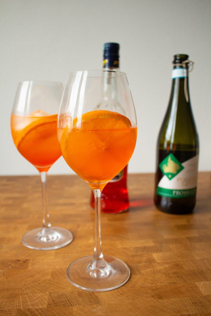 Aperol Spritz is a classic Italian apertivo, and they're so easy to make at home! I'm sharing the two different classic versions, and my own favorite aperol spritz recipe! | Teaspoon of Nose