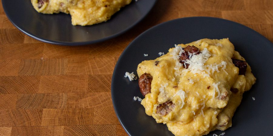 This cheesy sausage polenta is classic northern Italian food. It's also the ultimate comfort food for a weeknight dinner!