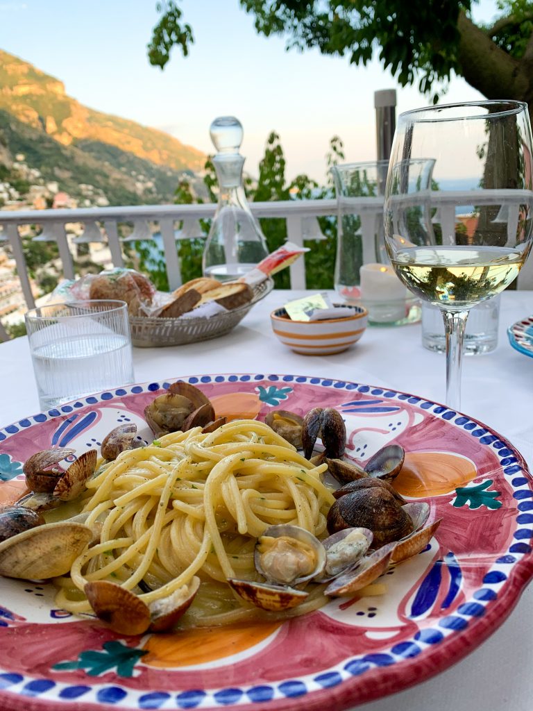 When you head to the Amalfi Coast, you're going to eat well. Here are my favorite Positano restaurants!
