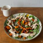 Complete with turkey, butternut squash, and cranberry vinaigrette, fall thanksgiving salad tastes just like the big meal!