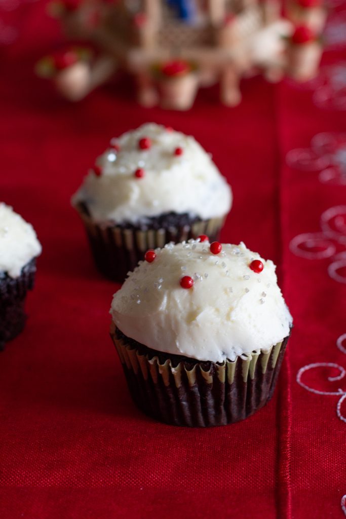Packed with deep chocolate flavor and topped peppermint swiss meringue buttercream, dark chocolate peppermint cupcakes are the Christmas dessert you didn't know you needed!!