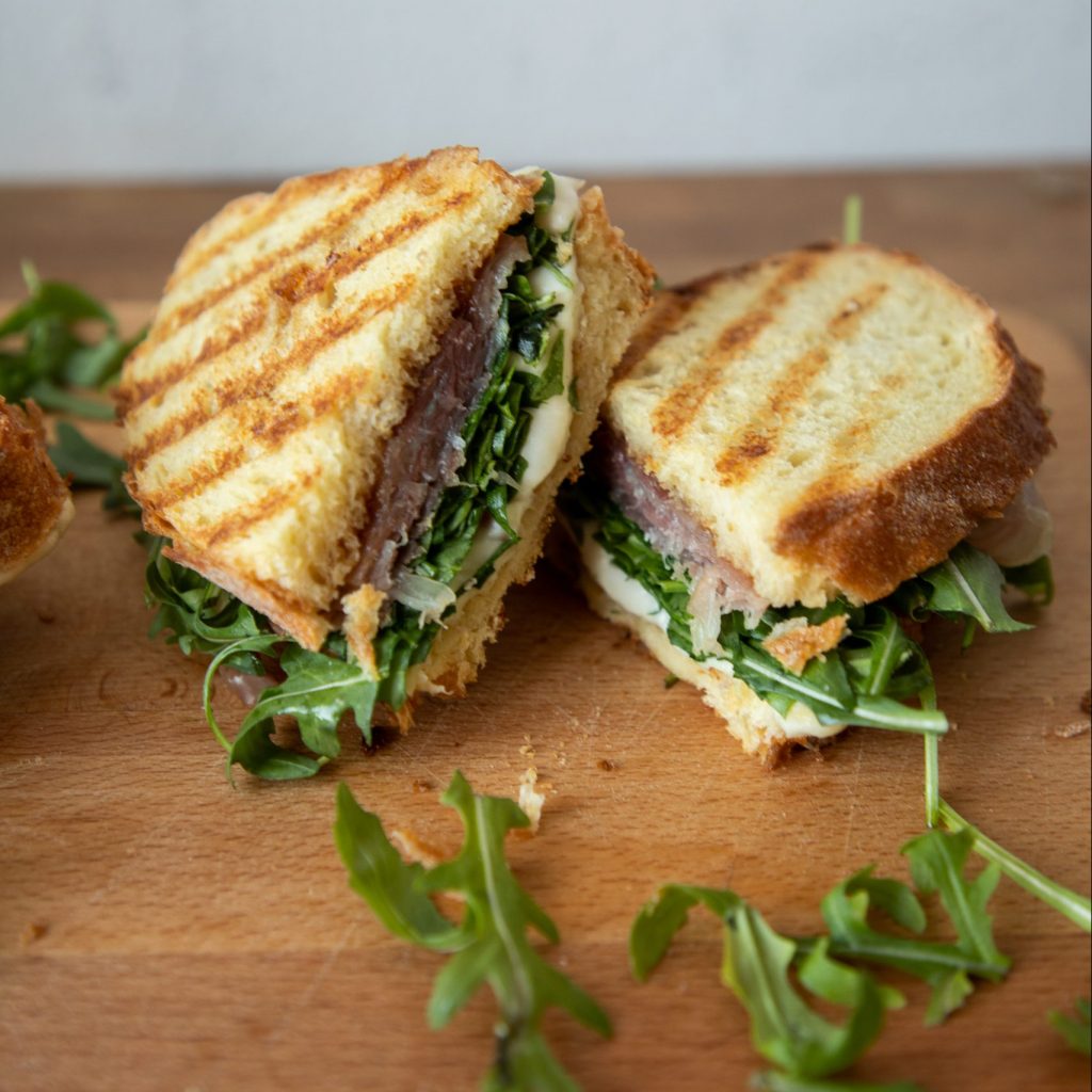 These prosciutto and mozzarella panini have a secret ingredient that ramp them up a notch to be the best sandwich you've ever tried! | Teaspoon of Nose