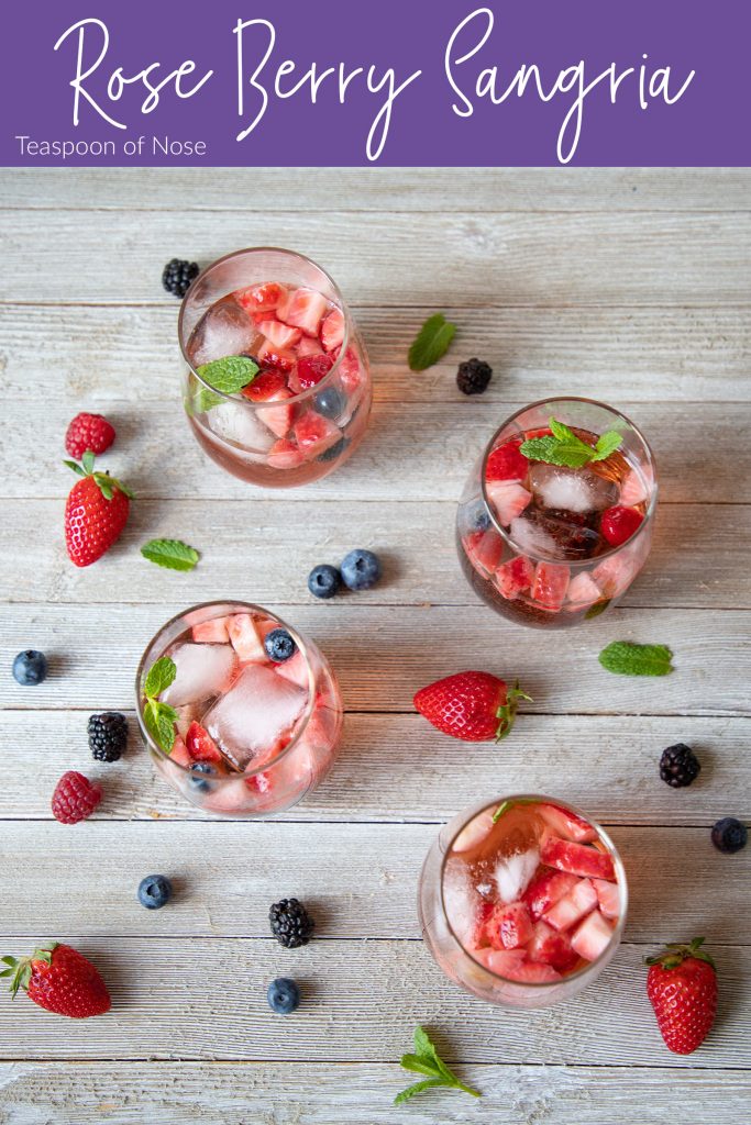 Berry rosé sangria is the perfect picnic sip! It's perfect to take on a day trip to the lake or the park, or just for a summer evening! | Teaspoon of Nose