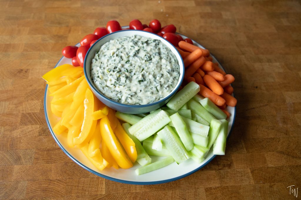 Hot spinach dip is the best appetizer for hosting - it's delicious, crave-able, and super easy to whip up!