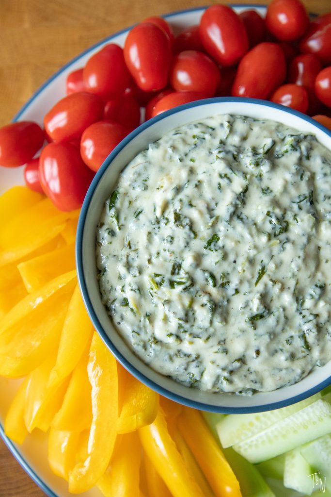 Hot spinach dip is the best appetizer for hosting - it's delicious, crave-able, and super easy to whip up!